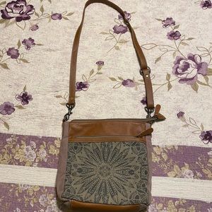 Myra cross body bag.  Like new condition.  Size 10x9.